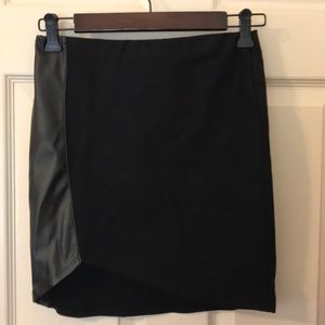 Black mini skirt with leather accent